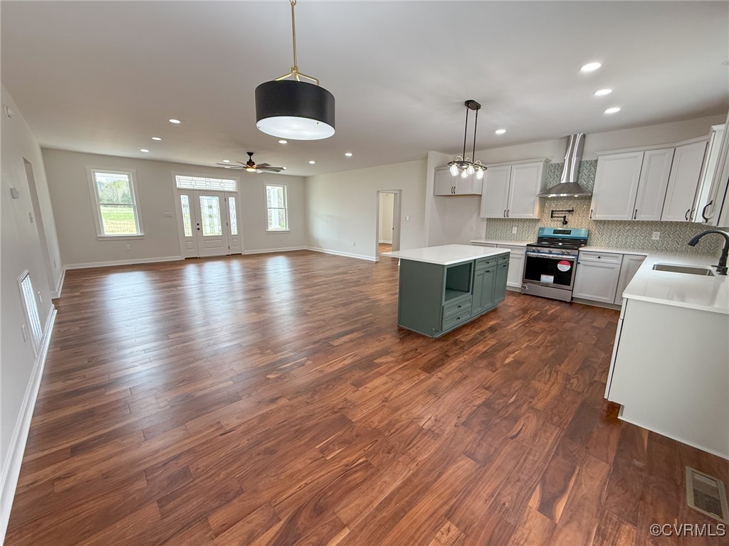 745 Robertsons Road Blackstone, VA 23824 - Photo 5 of 42 Kitchen featuring gas range, a sink, ceiling fan,