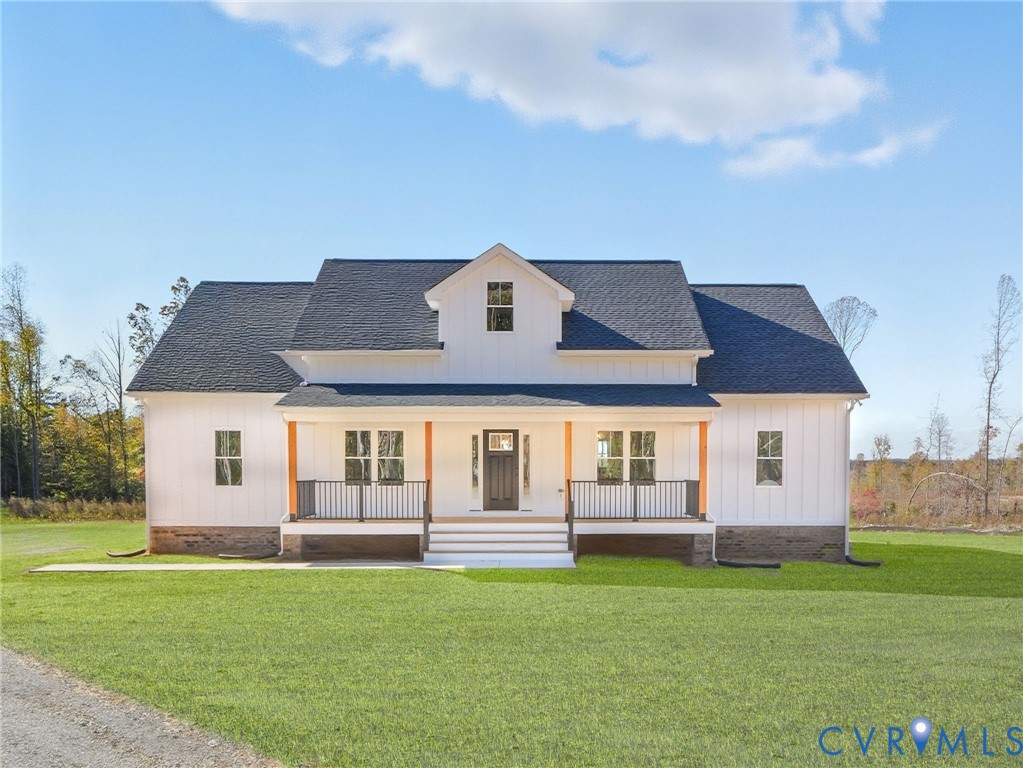 4301 Worsham Road Powhatan, VA 23139 - Photo 1 of 33 a front view of a house with a garden