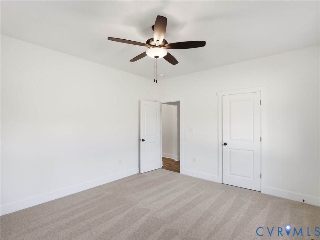 4301 Worsham Road Powhatan, VA 23139 - Photo 16 of 33 a view of empty room with wooden floor