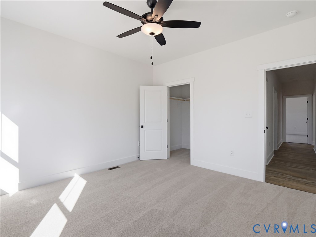 4301 Worsham Road Powhatan, VA 23139 - Photo 18 of 33 a view of an empty room with a window