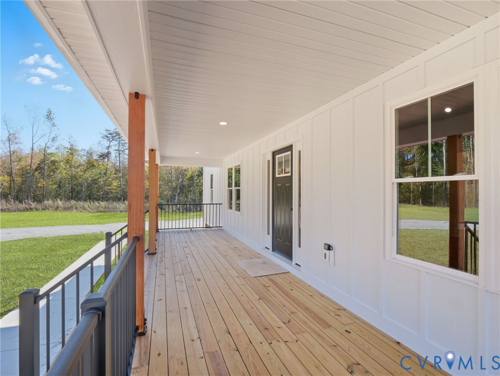 4301 Worsham Road Powhatan, VA 23139 - Photo 2 of 33 a view of a house with backyard and wooden floor