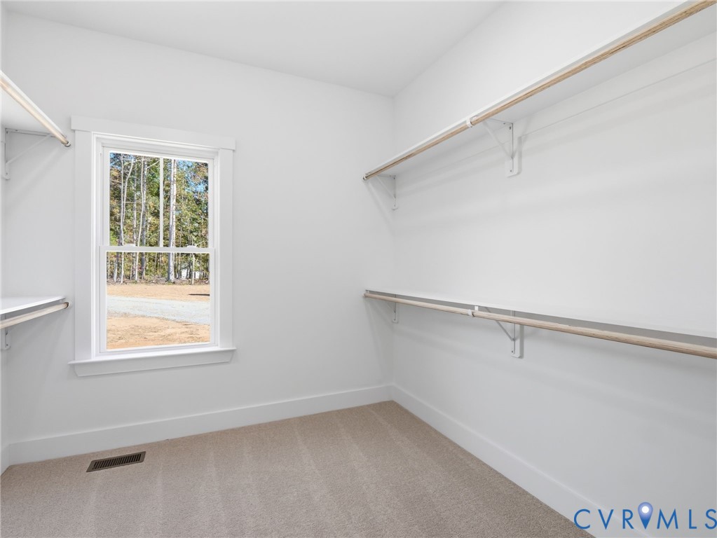 4301 Worsham Road Powhatan, VA 23139 - Photo 23 of 33 a view of an empty room with a window