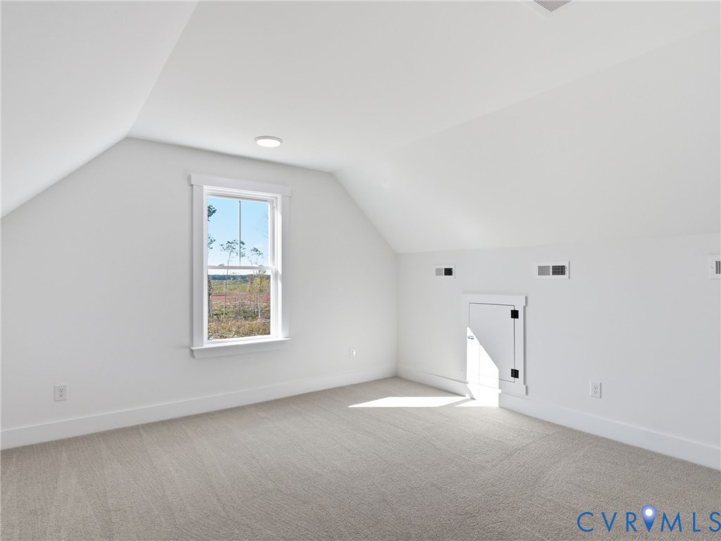4301 Worsham Road Powhatan, VA 23139 - Photo 27 of 33 an empty room with a window and wooden floor