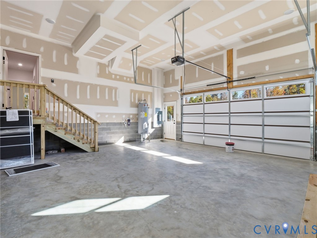 4301 Worsham Road Powhatan, VA 23139 - Photo 32 of 33 a view of a garage with furniture