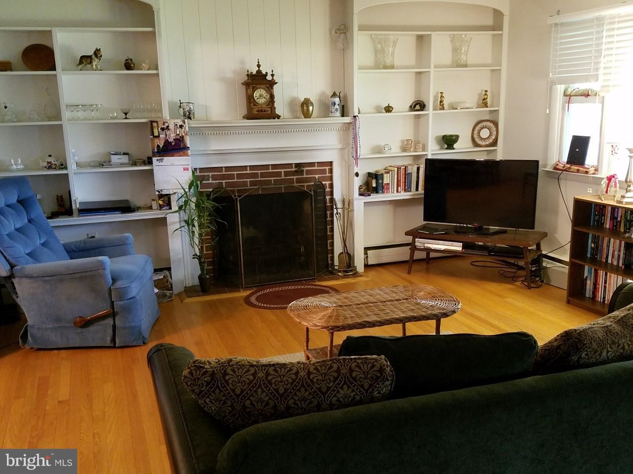 753 Gist Road Westminster, MD 21157 - Photo 2 of 13 Living Room w/Fireplace & Built in Bookcases
