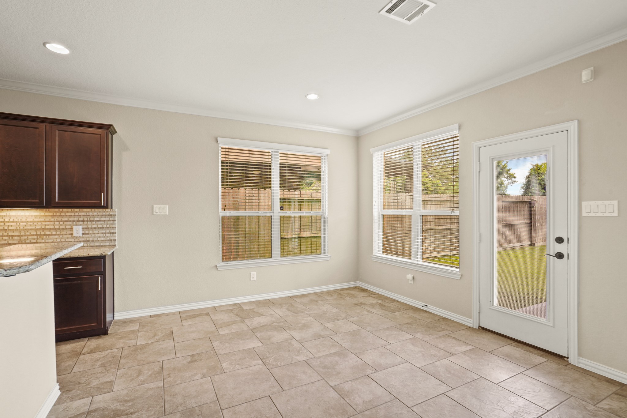 3414 Satton Ranch Lane Fulshear, TX 77441 - Photo 10 of 28 an empty room with windows