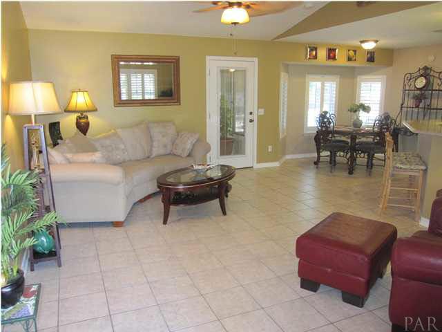 5987 Ridge Crest Court Milton, FL 32570 - Photo 2 of 24 Family room view from the foyer. Center door opens to the Florida room.
