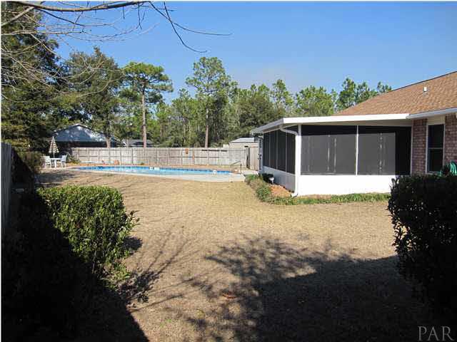 5987 Ridge Crest Court Milton, FL 32570 - Photo 22 of 24 Whole backyard is privacy fenced.