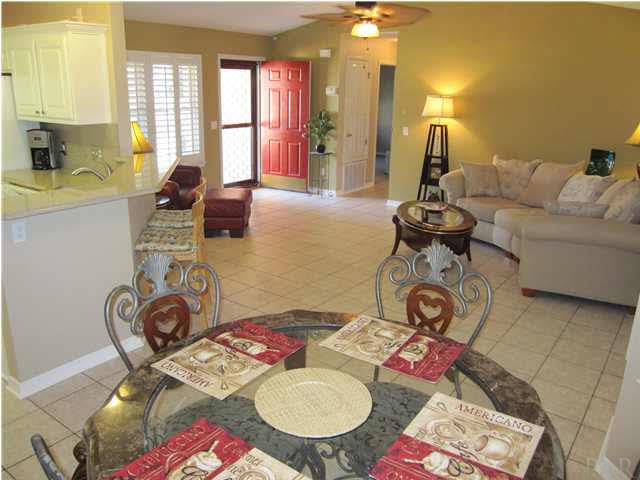 5987 Ridge Crest Court Milton, FL 32570 - Photo 4 of 24 Family room view from the eat-in kitchen. Florida room to your right.