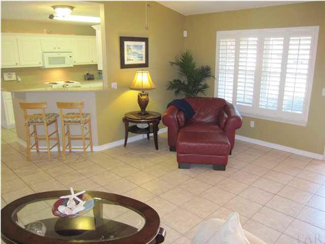 5987 Ridge Crest Court Milton, FL 32570 - Photo 5 of 24 Notice the plantation shutters in family room.