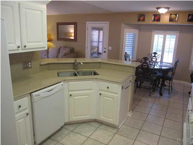 5987 Ridge Crest Court Milton, FL 32570 - Photo 8 of 24 Eat-in area has bay windows with a pool view.
