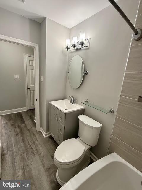 802 Devon Road Riverside, NJ 08075 - Photo 23 of 29 a bathroom with a toilet sink and mirror
