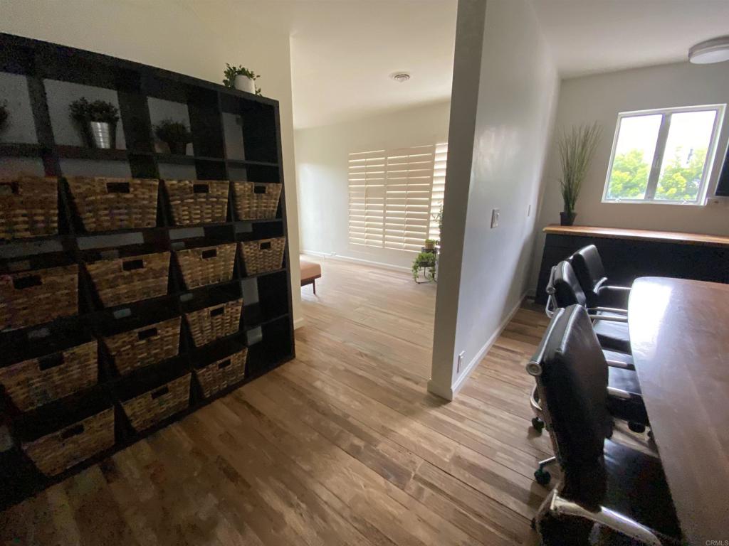 2159-65 Avenida De La Playa La Jolla, CA 92037 - Photo 17 of 42 a view of walk in closet with clothes and shoes