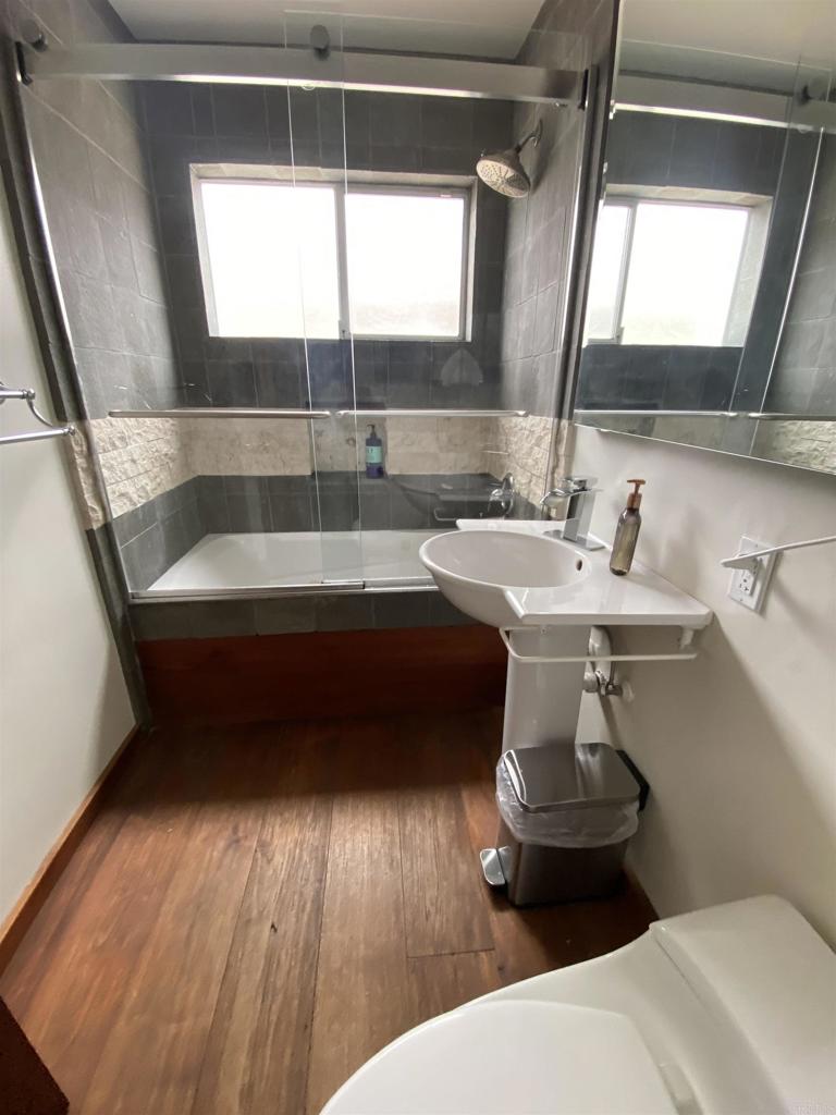 2159-65 Avenida De La Playa La Jolla, CA 92037 - Photo 21 of 42 a bathroom with a sink and a mirror