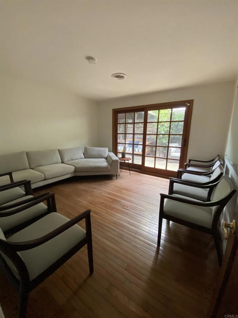 2159-65 Avenida De La Playa La Jolla, CA 92037 - Photo 23 of 42 a living room with furniture and a window