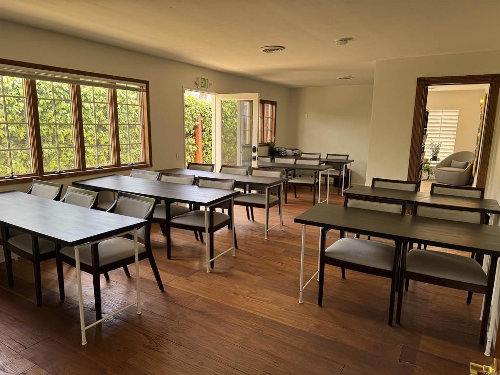 2159-65 Avenida De La Playa La Jolla, CA 92037 - Photo 34 of 42 a view of a a dining room with furniture window and wooden floor