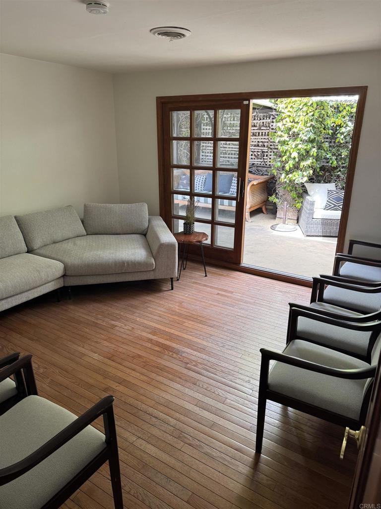 2159-65 Avenida De La Playa La Jolla, CA 92037 - Photo 38 of 42 a living room with furniture and a window