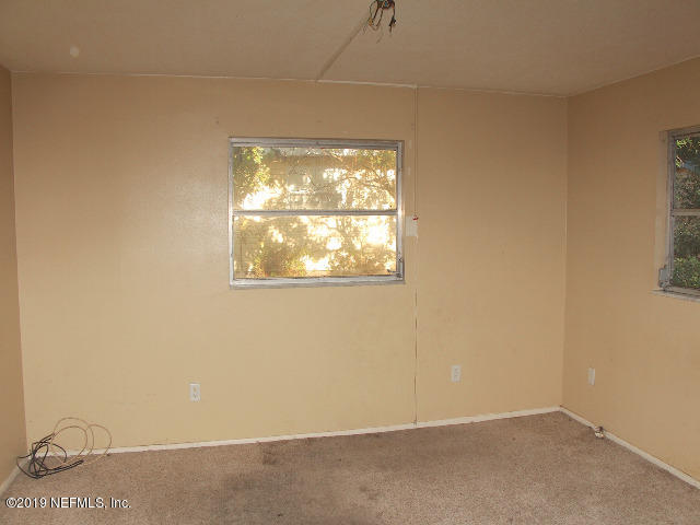 183 Shores Boulevard St. Augustine, FL 32086 - Photo 14 of 22 an empty room with a window