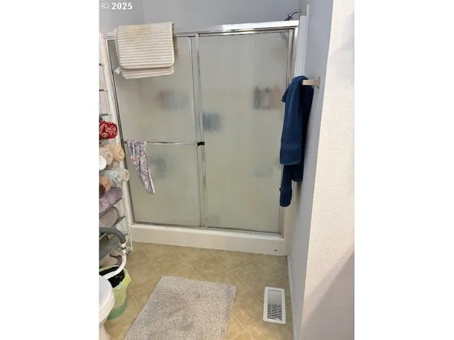 a front view of a house with glass windows