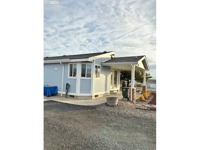 a car parked in front of a house
