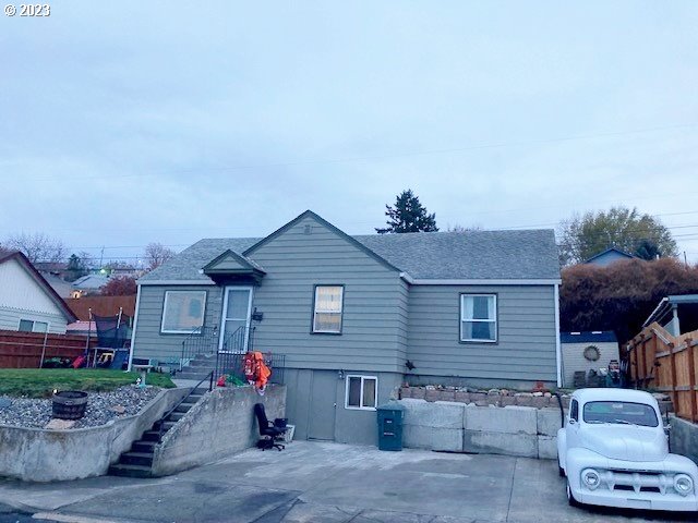 1308 Southwest Goodwin Place Pendleton, OR 97801 - Photo 4 of 19 a front view of a house with a garage