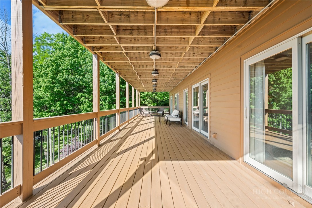 331 Alpine Road Blowing Rock, NC 28605 - Photo 40 of 50 a view of a balcony with wooden floor