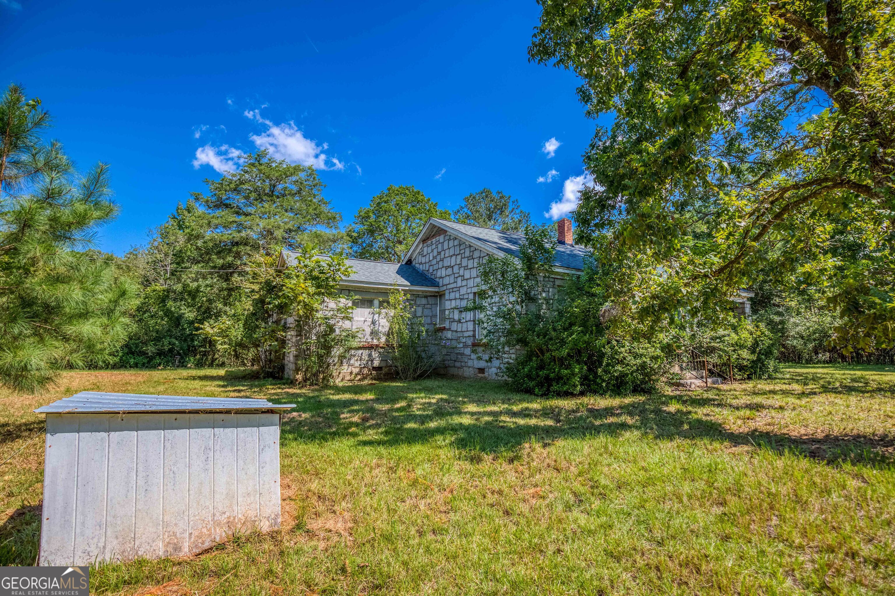 2688 Calhoun Falls Highway Elberton, GA 30635 - Photo 51 of 55 a view of a yard with a house in the background