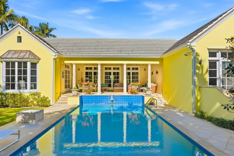 a view of a house with a swimming pool