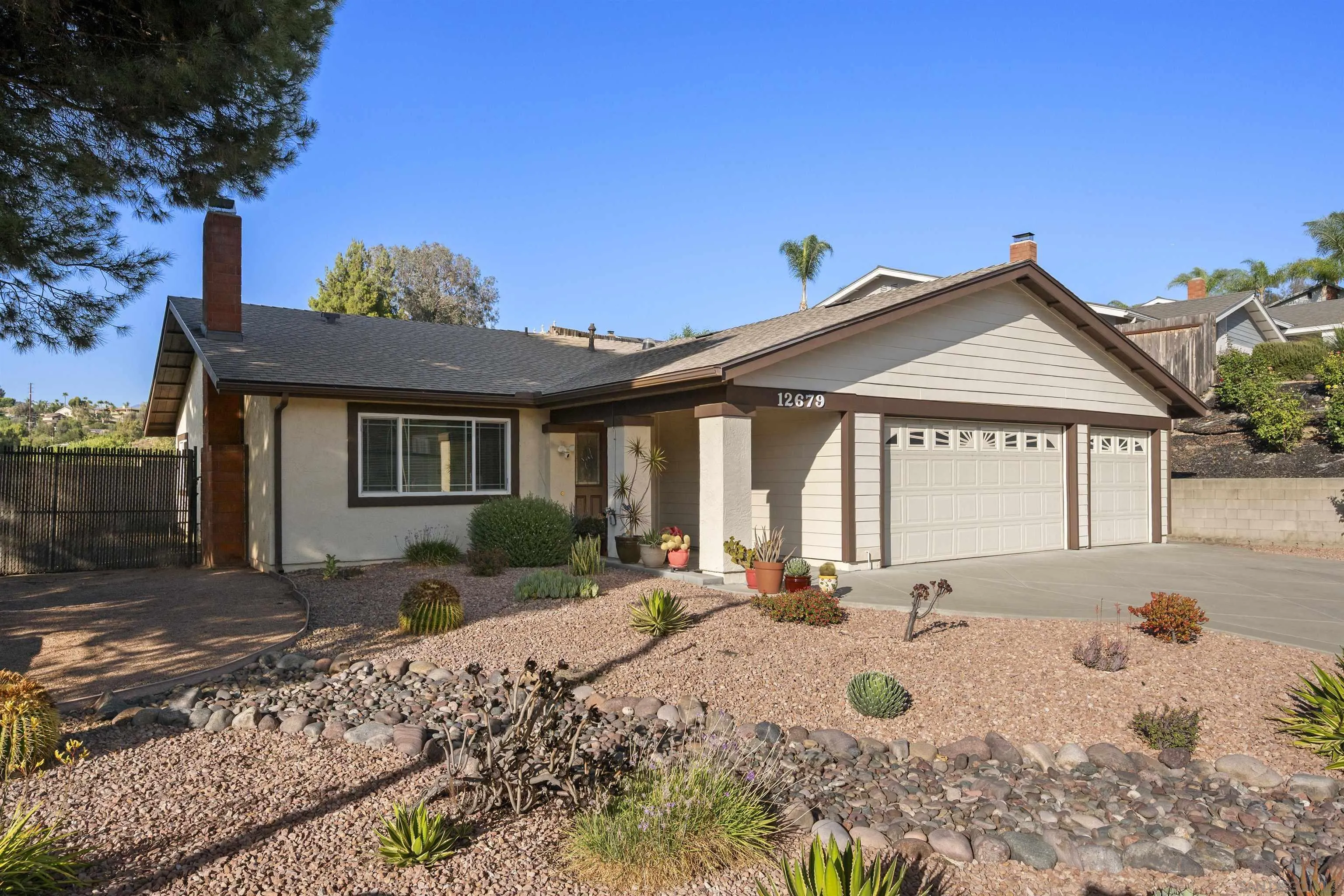 12679 Ridgeton Drive Lakeside, CA 92040 - Photo 1 of 33 a front view of a house with a yard