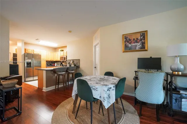a view of a dining room with furniture
