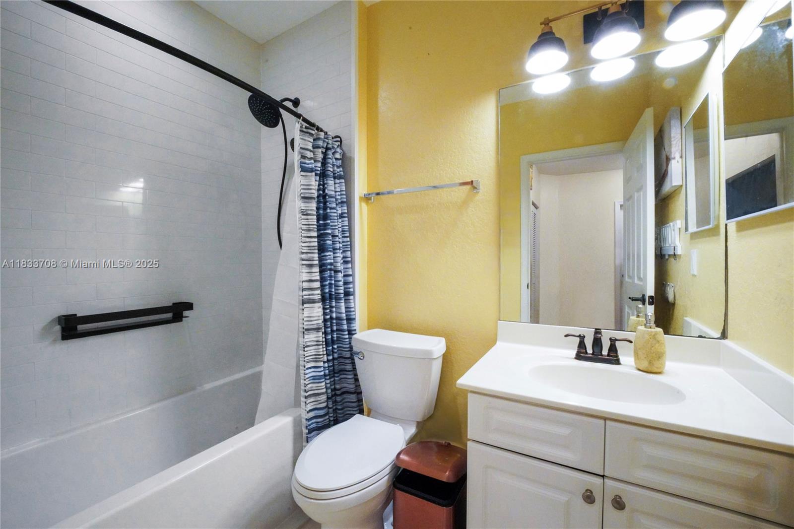 3335 Palomino Drive Davie, FL 33024 - Photo 21 of 31 a bathroom with a sink a toilet and shower