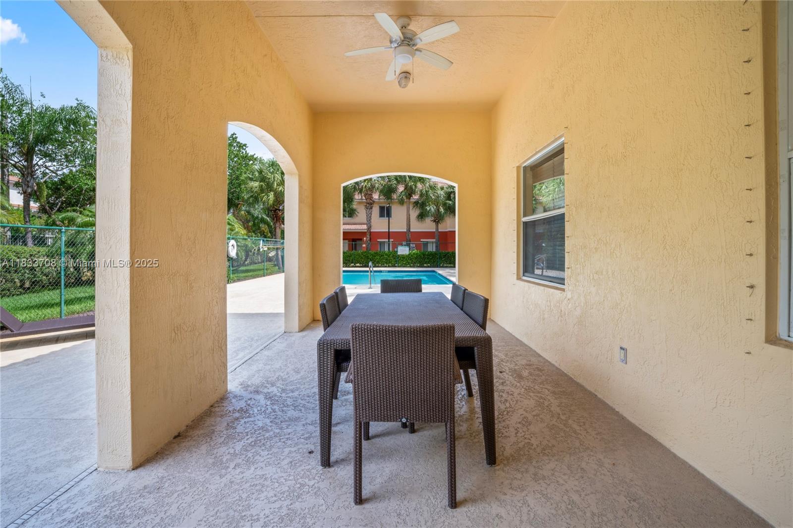 3335 Palomino Drive Davie, FL 33024 - Photo 25 of 31 a view of a dining room with furniture window and outside view