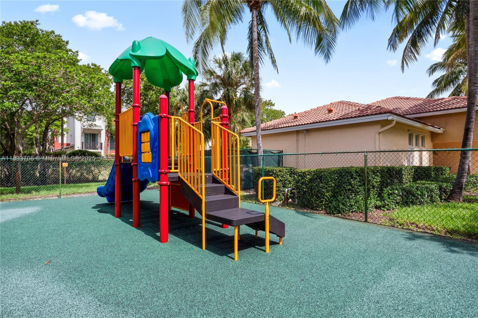 3335 Palomino Drive Davie, FL 33024 - Photo 28 of 31 a backyard of a house with table and chairs