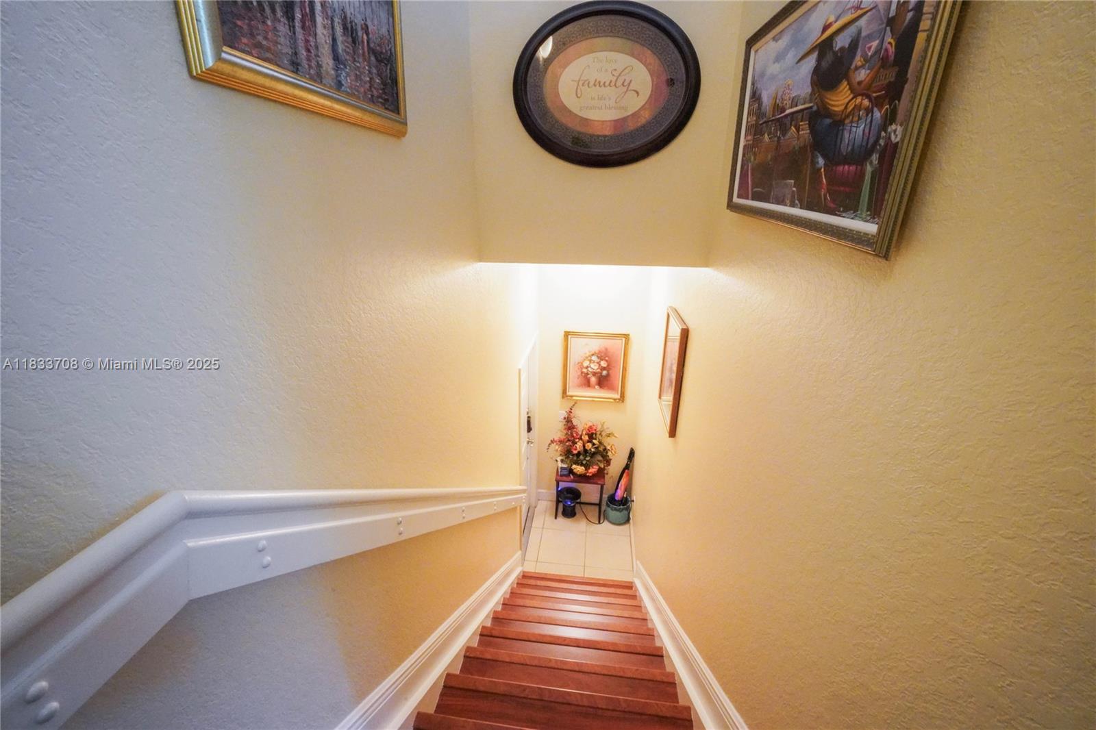 3335 Palomino Drive Davie, FL 33024 - Photo 6 of 31 a view of a hallway with wooden floor