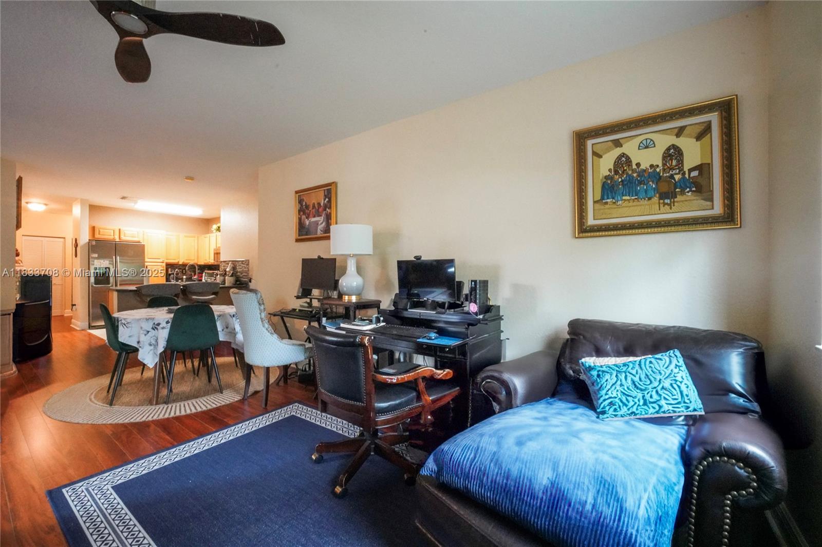 3335 Palomino Drive Davie, FL 33024 - Photo 7 of 31 a living room with furniture and a wooden floor