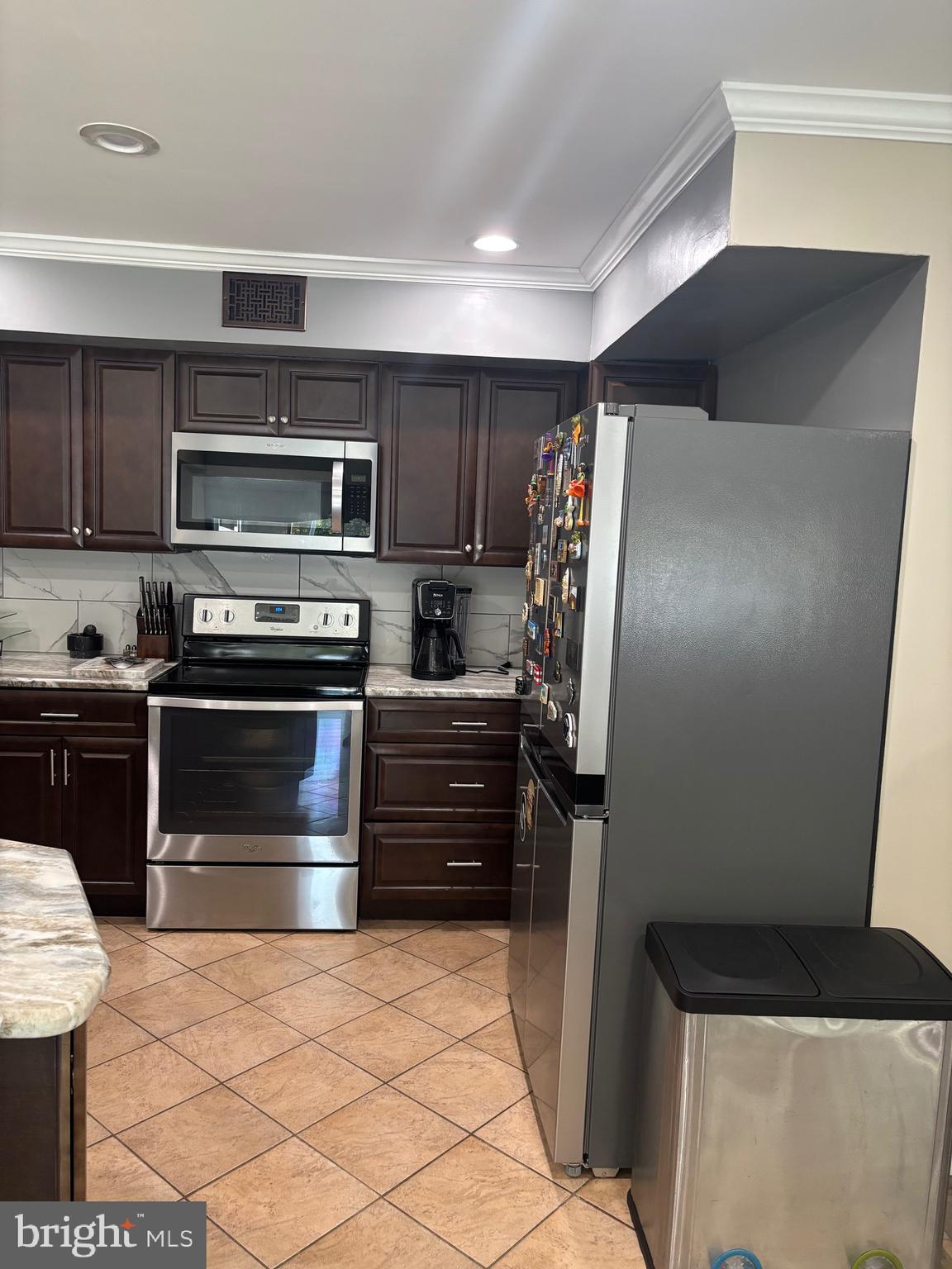 60 High Meadows Drive Sicklerville, NJ 08081 - Photo 22 of 60 a kitchen with a refrigerator and a stove top oven