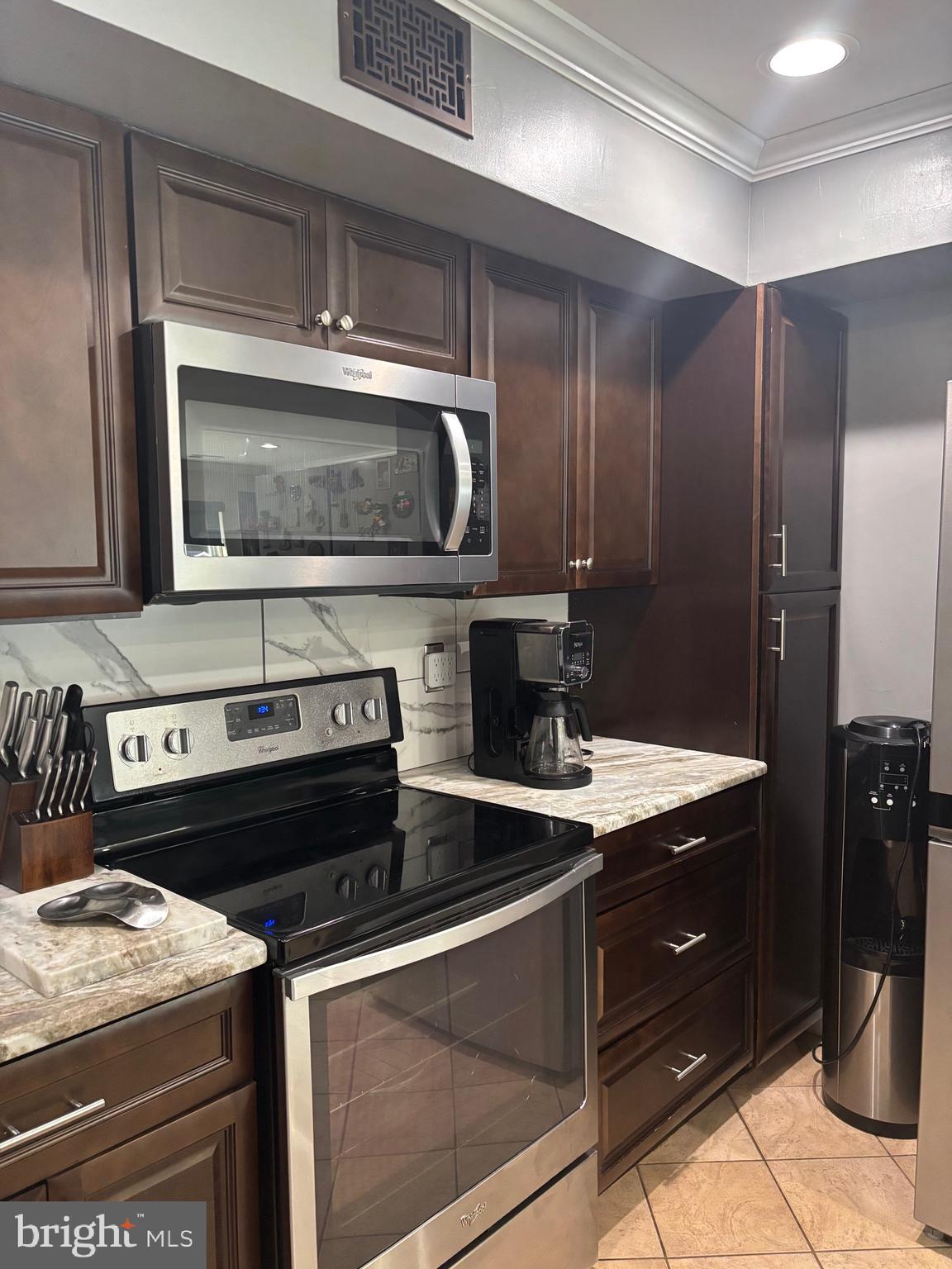 60 High Meadows Drive Sicklerville, NJ 08081 - Photo 24 of 60 a kitchen with a stove microwave and sink
