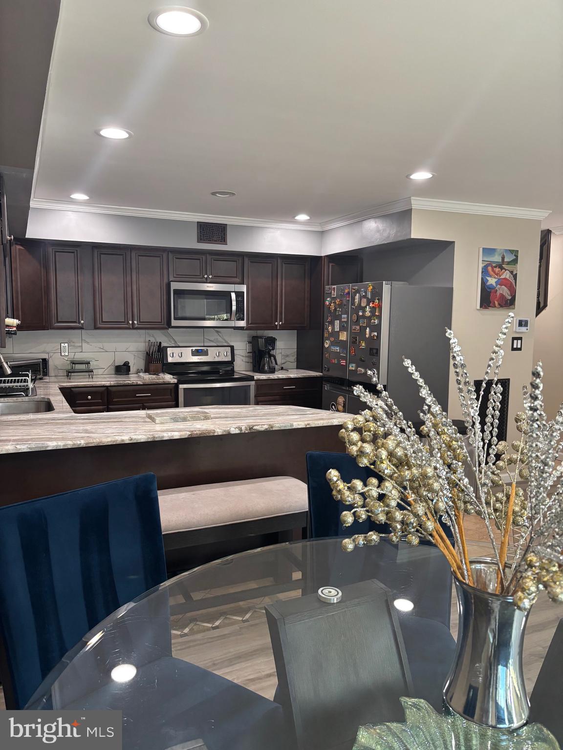 60 High Meadows Drive Sicklerville, NJ 08081 - Photo 25 of 60 a kitchen with stainless steel appliances granite countertop a sink and a stove