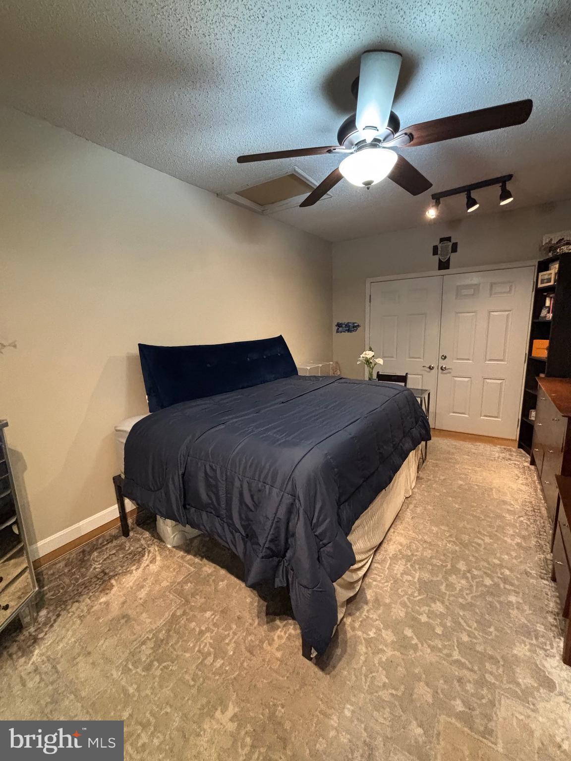 60 High Meadows Drive Sicklerville, NJ 08081 - Photo 30 of 60 a bedroom with a bed and ceiling fan
