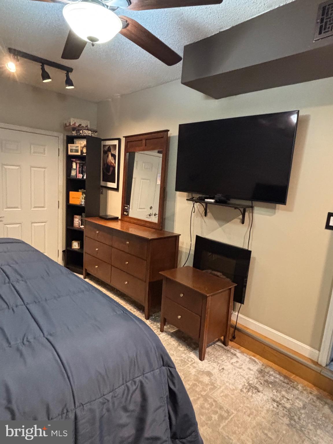 60 High Meadows Drive Sicklerville, NJ 08081 - Photo 31 of 60 a bedroom with a bed and flat screen tv