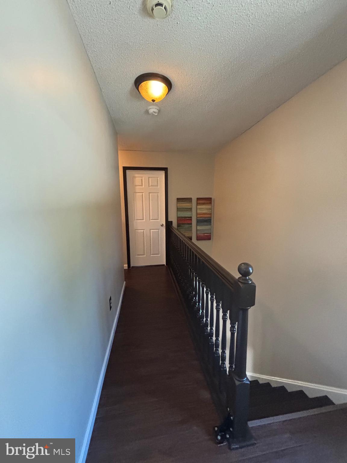 60 High Meadows Drive Sicklerville, NJ 08081 - Photo 42 of 60 a view of a hallway with wooden floor and staircase