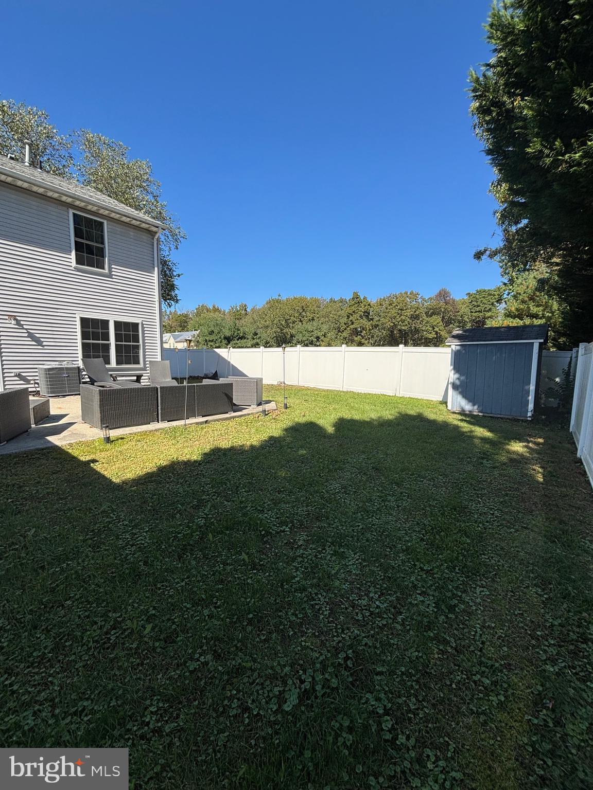 60 High Meadows Drive Sicklerville, NJ 08081 - Photo 51 of 60 a view of a house with a yard and a patio