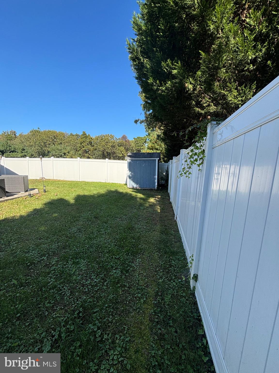 60 High Meadows Drive Sicklerville, NJ 08081 - Photo 52 of 60 a view of a backyard with a large tree