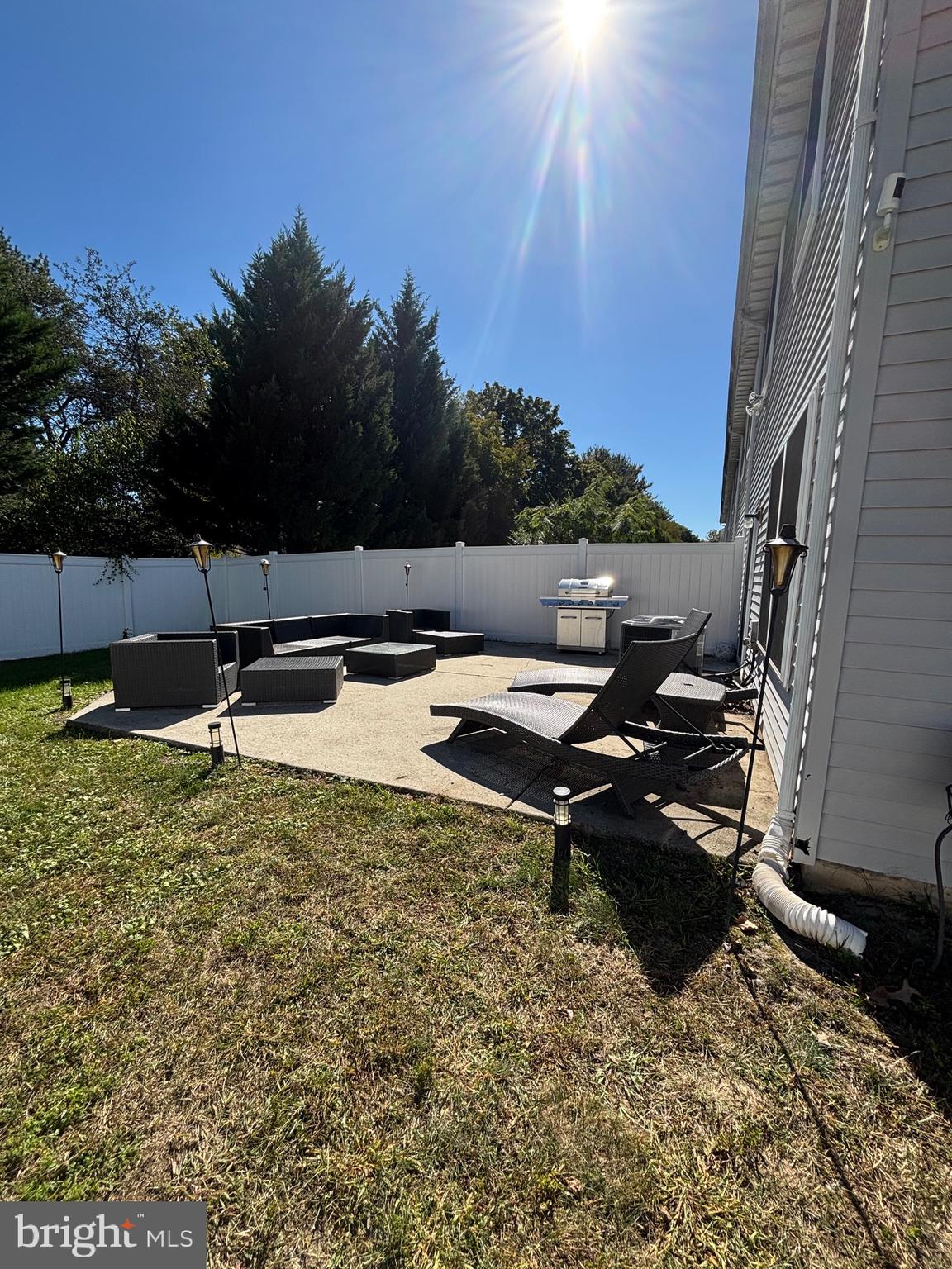 60 High Meadows Drive Sicklerville, NJ 08081 - Photo 56 of 60 a backyard of a house with table and chairs