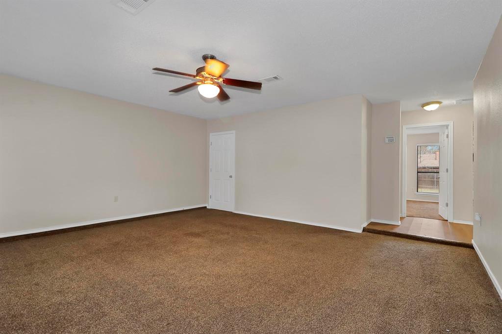 6632 Valley View Drive Watauga, TX 76148 - Photo 6 of 18 a view of a room with wooden floor and window