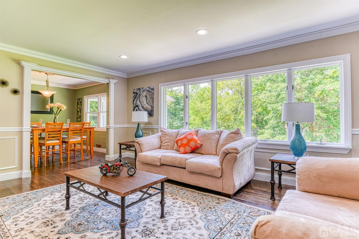121 Branch Road Bridgewater, NJ 08807 - Photo 3 of 41 a living room with furniture and a large window