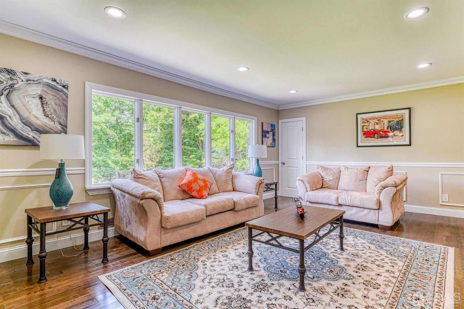 121 Branch Road Bridgewater, NJ 08807 - Photo 4 of 41 a living room with furniture and a large window