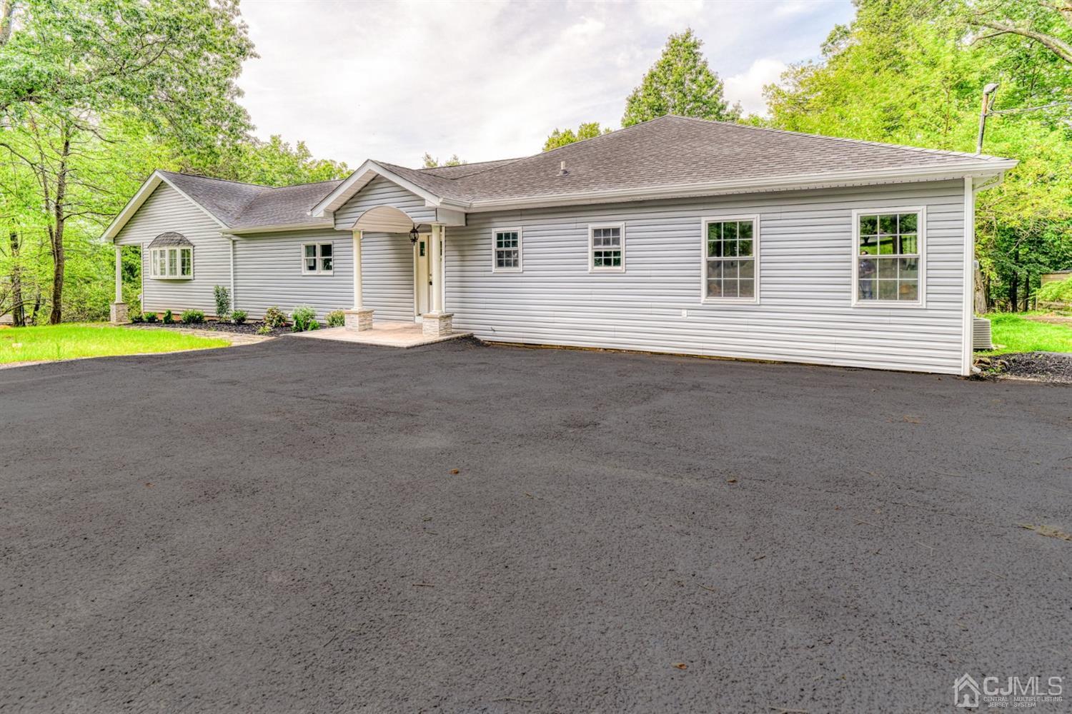 121 Branch Road Bridgewater, NJ 08807 - Photo 40 of 41 a view of a house with a street