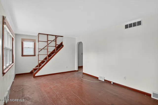 an empty room with windows