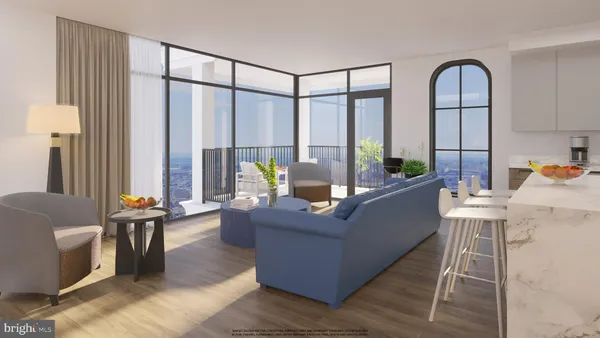 a living room with furniture and large windows